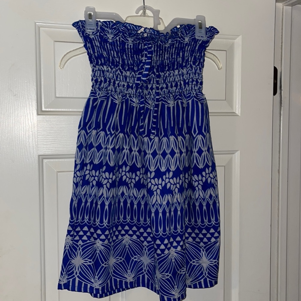 Swim cover up. Elastic top with bow. Size M.